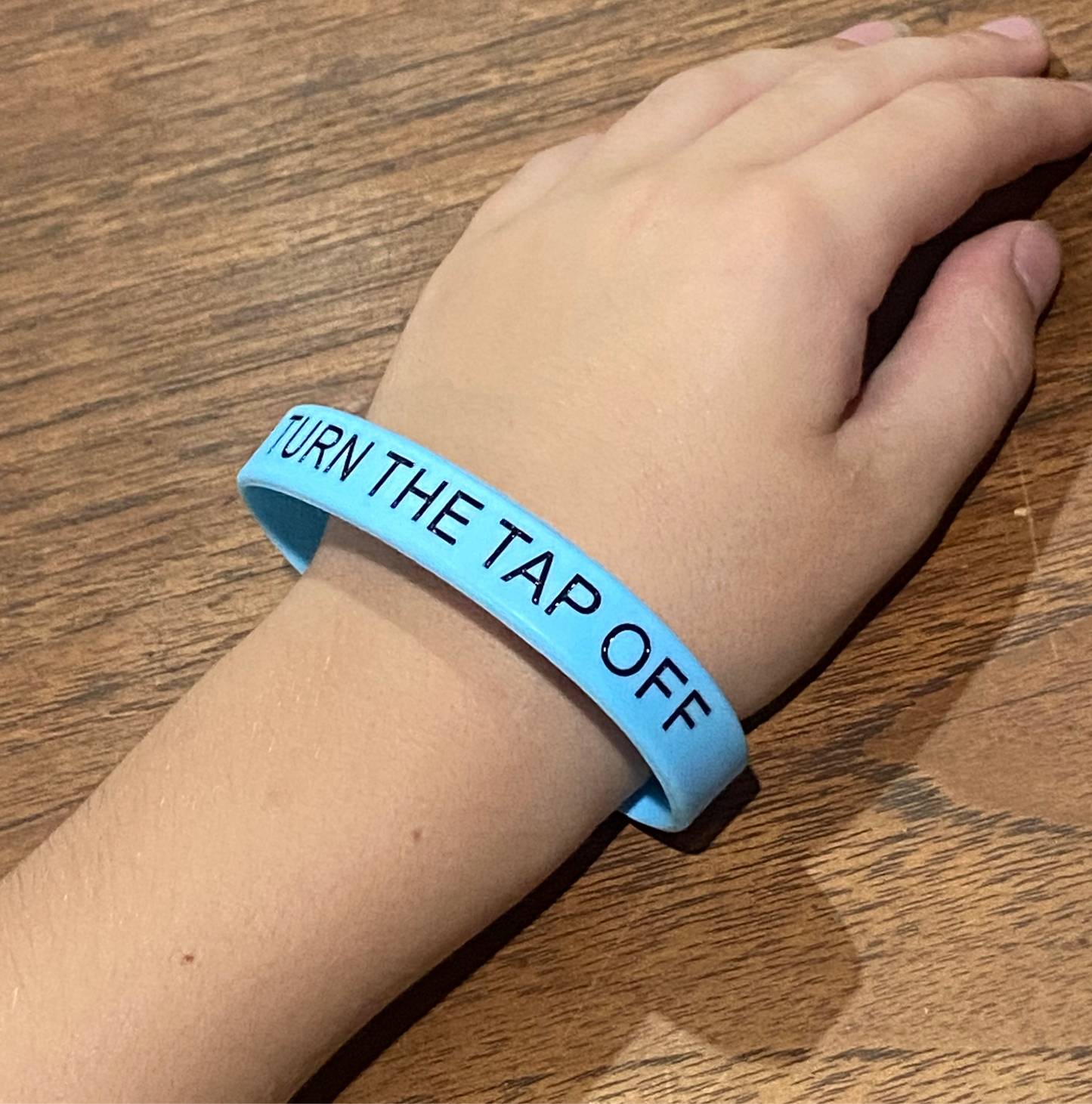 Turn the tap off - Silicon wrist band