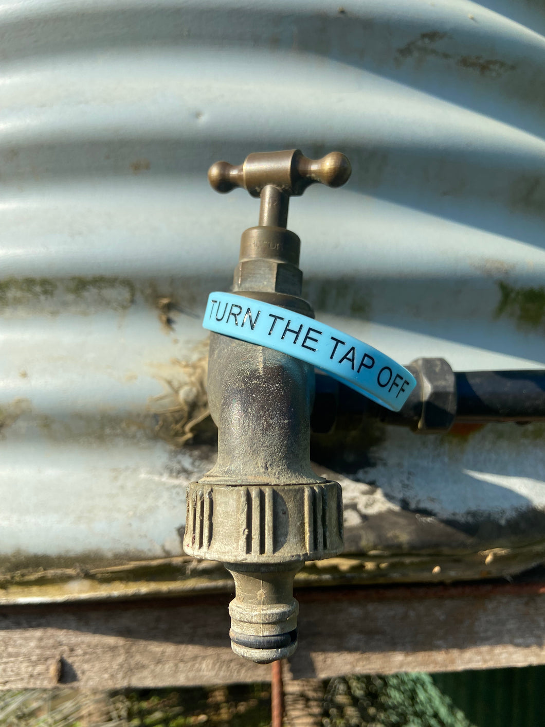Turn the tap off - Silicon wrist band